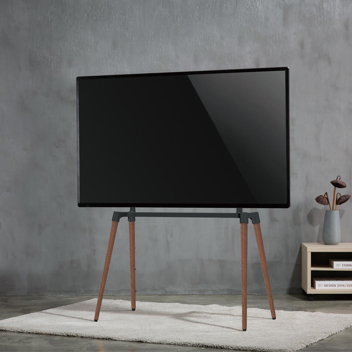 TV Bodenständer | 60-75 " | maximal unterstützes Bildschirmgewicht: 40 kg | Scandinavian Design | Anti-Kipp-Gurt | Schnappverschluss | Aluminium / Stahl | Schwarz